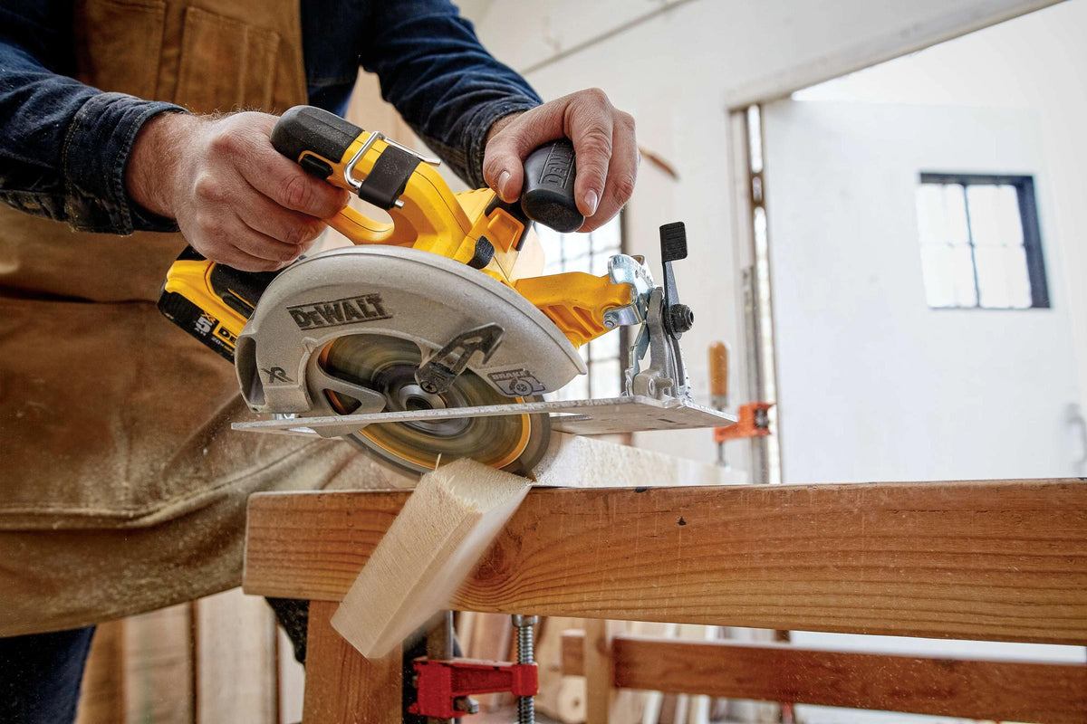DEWALT cordless circular saw cutting lumber